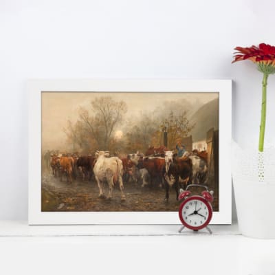 Rustic cattle farm scene vintage wall art with earthy tones and serene countryside charm. displayed on the wall in a black frame