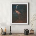 Vintage wall art of a pink flamingo standing in a dark, natural setting with elegant contrast and tropical plants in the background. displayed on the wall