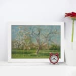 Vintage wall art of a spring meadow with a blossoming tree in soft pink, green, and blue tones by Infidu. displayed on the wall