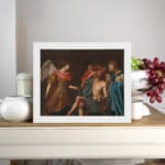 Vintage religious wall art with an angel and three figures in muted robes on a dark background. displayed on the wall