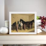 Vintage stable wall art with calm horses standing on hay in soft natural tones. displayed on the wall