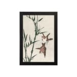 Infidu vintage wall art with two birds flying near bamboo in soft tones. hung on the wall