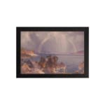 Vintage wall art of a calm lake with a rainbow, mountains, and soft sunlight. hung on the wall