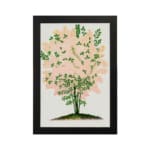 Infidu vintage wall art of a delicate pink blossom tree with green leaves and a white background. hung on the wall