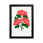 Infidu vintage wall art featuring delicate pink flowers and vibrant green leaves against a white background with a sleek black frame. hung on the wall on a white background