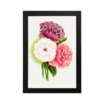 Infidu vintage wall art featuring three large flowers in purple, white, and coral pink with green leaves and a soft watercolor background. hung on the wall
