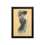 Vintage wall art of an elegant 20th-century lady in a blue hat and dark dress with a white stole on a beige background. hung on the wall