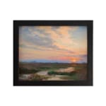 Infidu vintage wall art featuring a peaceful landscape at sunrise with soft blue, pink, and orange skies over lush green fields and distant hills. hung on the wall on a white background