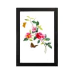 Vintage art of pink and red flowers with green leaves, two orange and brown butterflies, framed in black. hung on the wall