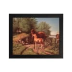 Two horses in a countryside setting with trees, grass, and soft sky tones, framed in black – vintage wall art by Infidu. hung on the wall