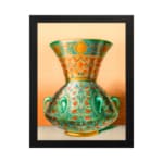 Vintage wall art featuring a decorative green vase with floral and geometric patterns, framed in black. hung on the wall