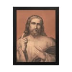 Vintage wall art of Jesus Christ holding a book, raising one hand, with soft, muted colors and a warm terracotta background. hung on the wall