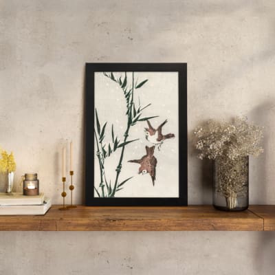 Infidu vintage wall art with two birds flying near bamboo in soft tones. displayed on the wall