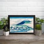 Vintage wall art of Mount Fuji with white cranes and flying birds in a peaceful nature scene. displayed on the wall