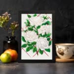 Vintage art of white roses with green leaves and red geometric background, framed for classic elegance. displayed on the wall