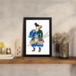 Vintage wall art of a Japanese warrior in colorful armor holding a bow with arrows, set against a white background with a black border. displayed on the wall