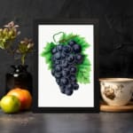 Vintage wall art of dark purple grapes with green leaves on a white background. displayed on the wall