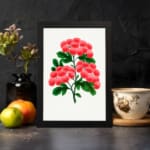Infidu vintage wall art featuring delicate pink flowers and vibrant green leaves against a white background with a sleek black frame. displayed on the wall art in a black frame