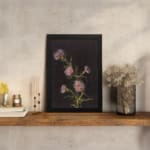 Vintage floral wall art with pink and purple flowers on black background by Infidu displayed on the wall