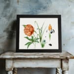 Vintage botanical wall art with orange peony, yellow and purple iris, and green leaves, featuring small insects, framed in black. displayed on the table