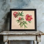 Infidu vintage wall art of blooming pink flowers with green leaves on a warm beige background. displayed on the wall