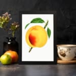Ripe golden peach with green leaves on a white background, vintage wall art. displayed on the wall