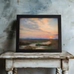 Infidu vintage wall art featuring a peaceful landscape at sunrise with soft blue, pink, and orange skies over lush green fields and distant hills. displayed on the wall art in a black frame