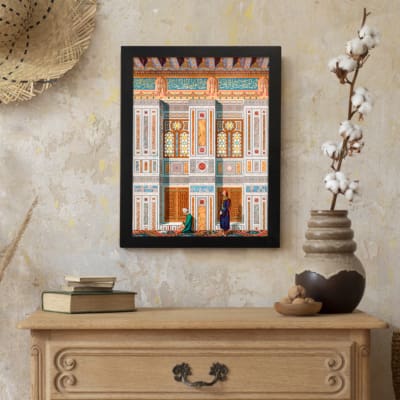 Vintage architectural wall art with two traditional figures, colorful tile patterns, and detailed building elements in black frame. displayed on the wall