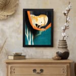 Vintage Japanese shrimp illustration on teal background with orange branch and black frame displayed on the wall in a black frame