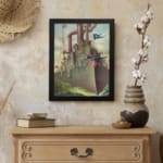Vintage battleship with American flags sailing through choppy waters, framed in black. displayed on the wall