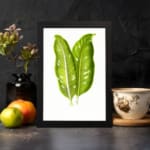 Vintage wall art featuring two large tropical green leaves with white lines and holes, set against a plain white background in a black frame. displayed on the wall