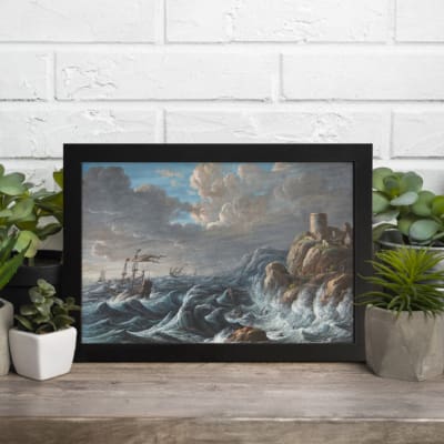Vintage wall art of a dramatic ocean storm with waves, rocky cliffs, and a stone tower. displayed on the wall