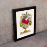 Infidu vintage wall art featuring a colorful floral arrangement in an elegant vase against a white background. displayed on the wall art in a black frame