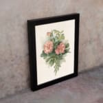 Infidu vintage pink floral wall art with two pink flowers and green leaves on a beige background in a black frame. displayed on the wall