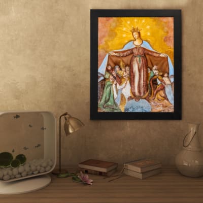 Vintage wall art of the Virgin Mary protecting people under her cloak in earthy tones. displayed on the wall