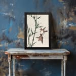 Infidu vintage wall art with two birds flying near bamboo in soft tones. displayed on the wall