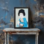 Vintage wall art of a graceful Japanese woman in a soft-toned kimono holding a fan. displayed on the wall