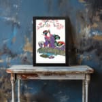 Vintage wall art of a Japanese woman in a purple kimono beneath cherry blossoms. displayed on the wall