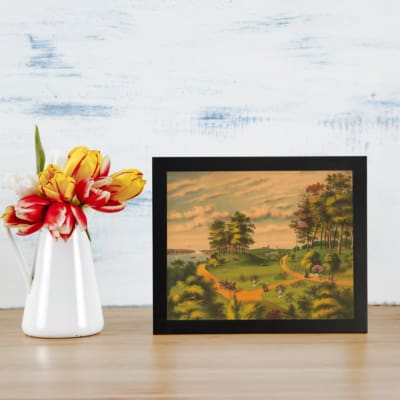 Infidu Countryside vintage wall art showing a sunset glow over winding paths, green hills, trees, people, cows, and horses by a calm river. displayed on the wall