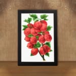 Vintage botanical wall art of red gooseberries and green leaves on a white background. displayed on the wall