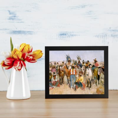 Vintage wall art of cowboys and Native Americans in a desert scene with warm earthy colors and a painterly style. displayed on the wall