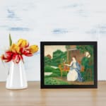 Vintage wall art of a woman in a white dress with flowers, set in a peaceful countryside scene with trees and a distant structure. displayed on the wall