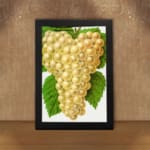 Vintage art of golden yellow grapes with green leaves on a white background. displayed on the wall