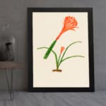 Infidu Elegant Orange Flower Vintage Wall Art featuring a vibrant orange flower with green leaves, framed in black. displayed on the wall