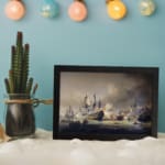 Vintage naval battle wall art showing ships in combat on stormy seas with dramatic smoke and cannon fire. displayed on the wall