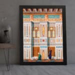 Vintage architectural wall art with two traditional figures, colorful tile patterns, and detailed building elements in black frame. displayed on the wall
