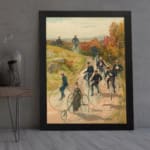 Vintage wall art of people cycling through the countryside with autumn trees and a blue sky, framed in black. displayed on the wall