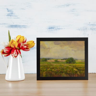 Infidu vintage countryside wall art with rolling hills and open fields in warm, earthy tones. displayed on the wall