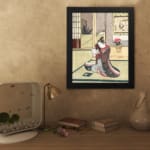 Infidu Asian-style vintage wall art featuring a traditionally dressed couple in a serene indoor setting with intricate details. displayed on the wall in a black frame