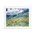 Infidu vintage countryside wall art with green hills and swirling blue sky. hung on the wall